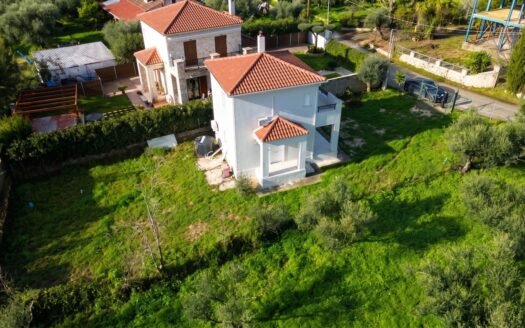 Two storey villa with olive grove views close to the resort of Tsilivi